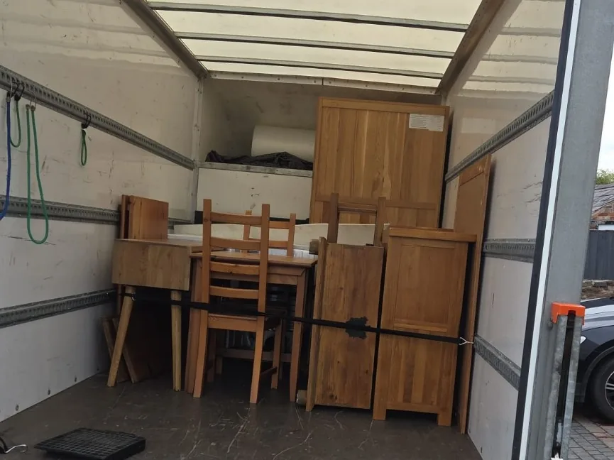 Dining furniture secured inside a removal van