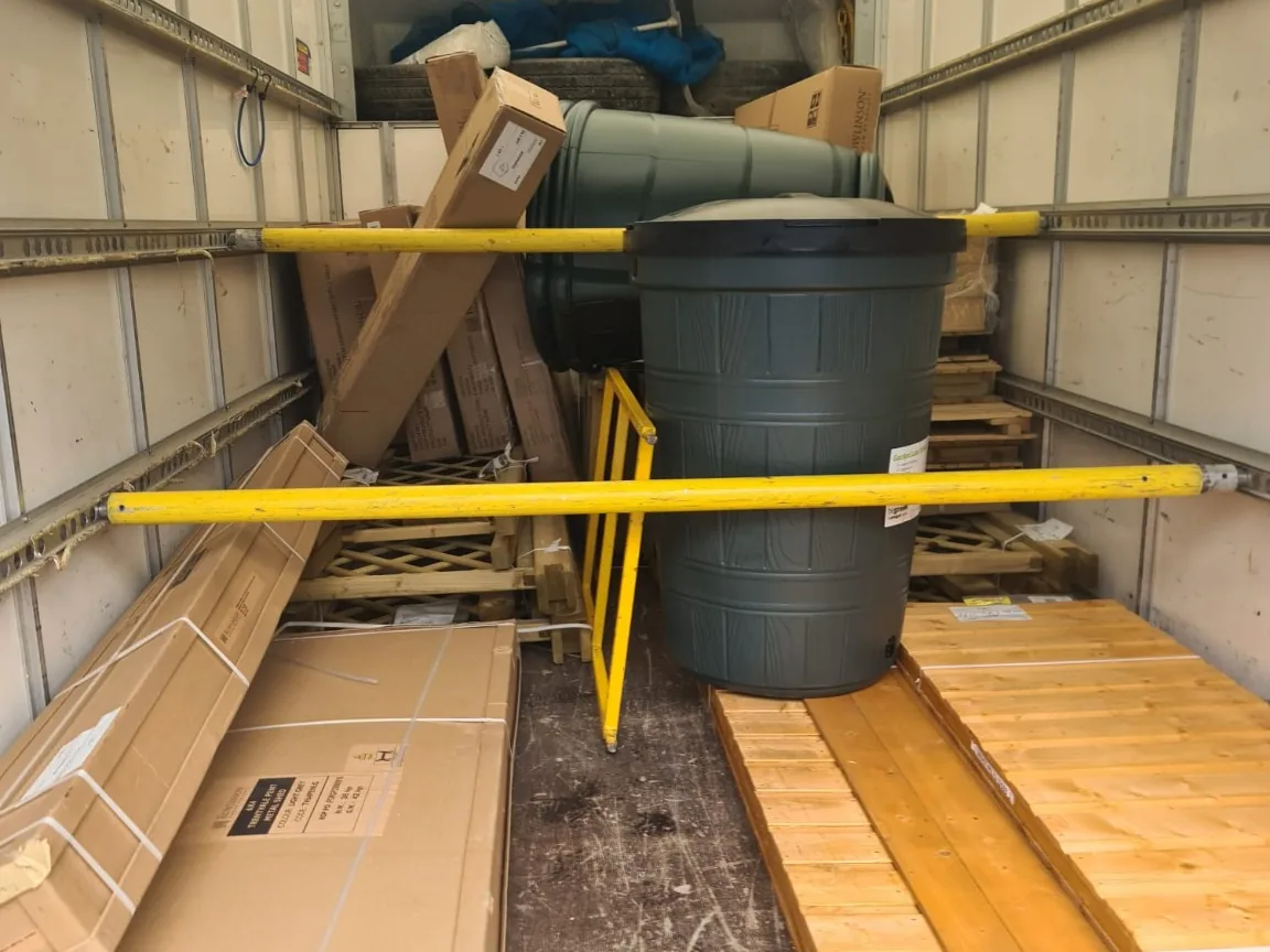 Wrapped commercial appliances secured inside a delivery van